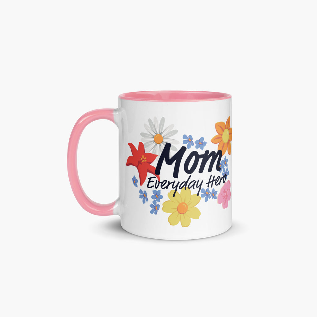 Mug with pink handle and interior featuring 'Mom Everyday Hero' text and colorful flowers on a white background