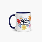 Mug with navy handle and interior featuring 'Mom Everyday Hero' text and colorful flowers on a white background