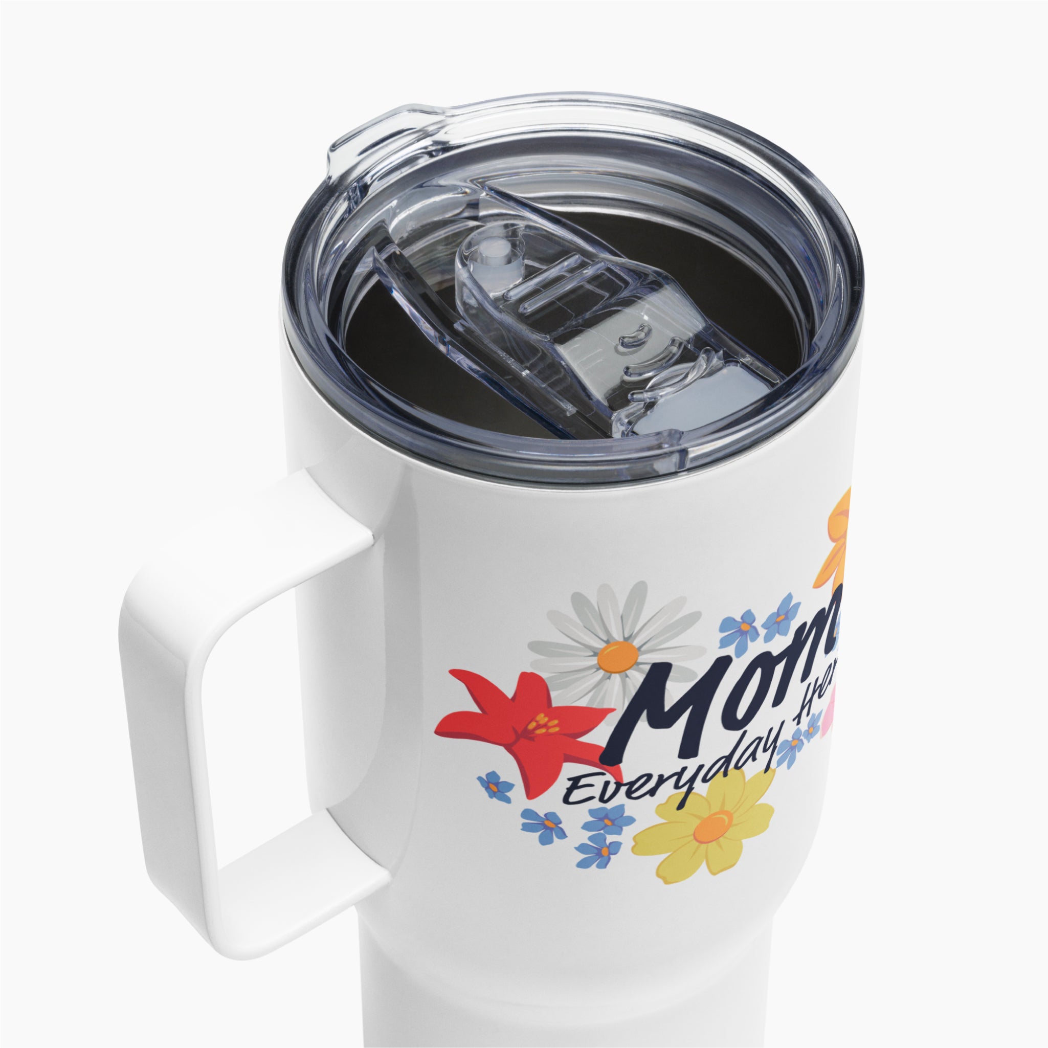 White travel mug with colorful floral design and 'Mom Everyday Hero' text on a white background