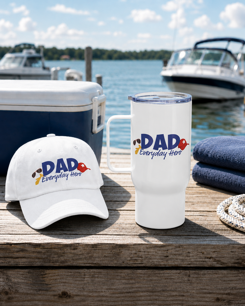 White cap and tumbler with 'DAD Everyday Here' text on a dock with boats in the background