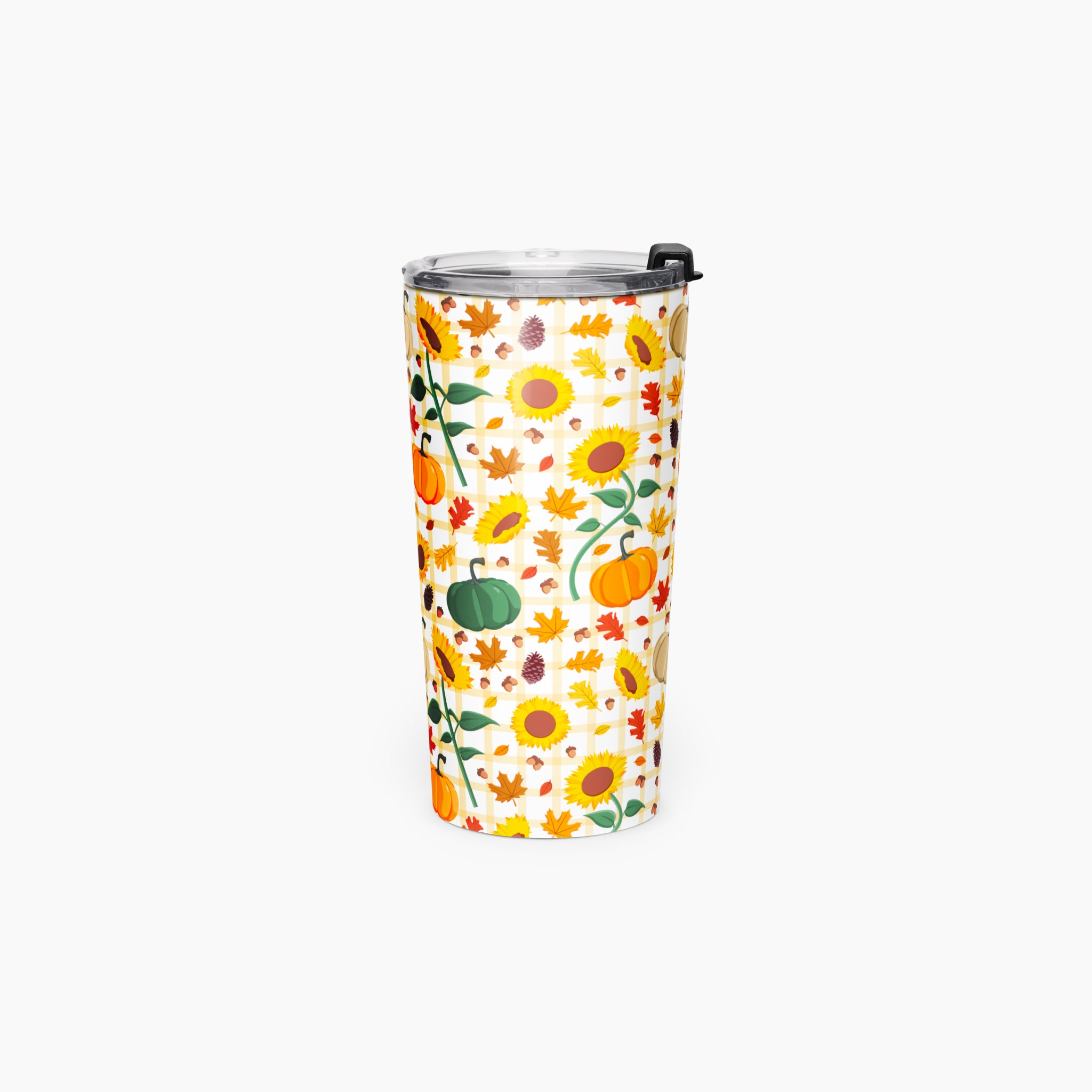 A tall insulated tumbler with a clear lid and black flip cover, decorated with a colorful autumn pattern of sunflowers, pumpkins, leaves, and acrons on a light-grey background.
