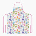 Colorful apron with birthday-themed pattern on a white background