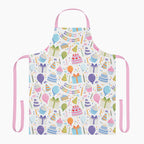 Colorful apron with birthday-themed pattern on a white background