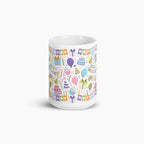 White mug with colorful birthday-themed design on a white background