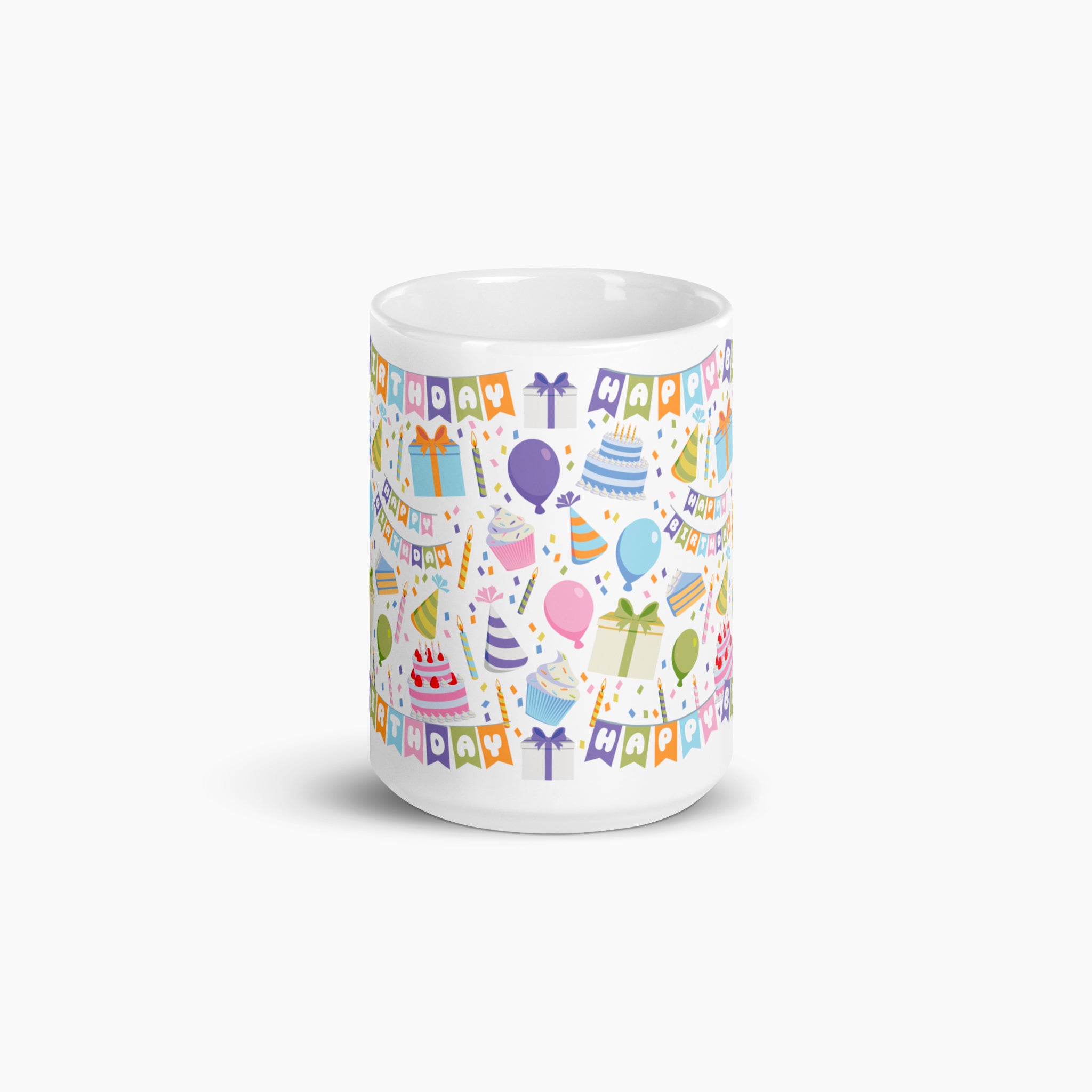 White mug with colorful birthday-themed design on a white background