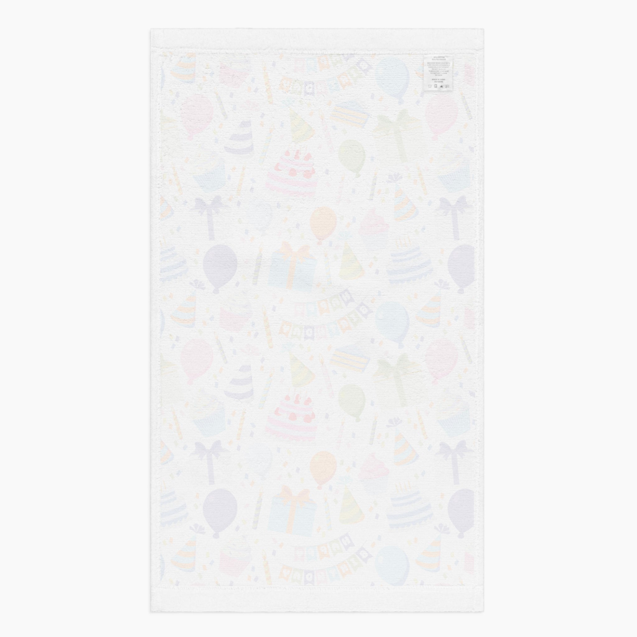 White back of Cloth kitchen hand towel with birthday-themed pattern on a white background
