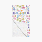 Table runner with birthday-themed design on a white background