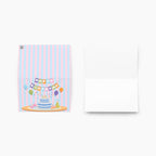 Greeting card with birthday cake and balloons design on a white background