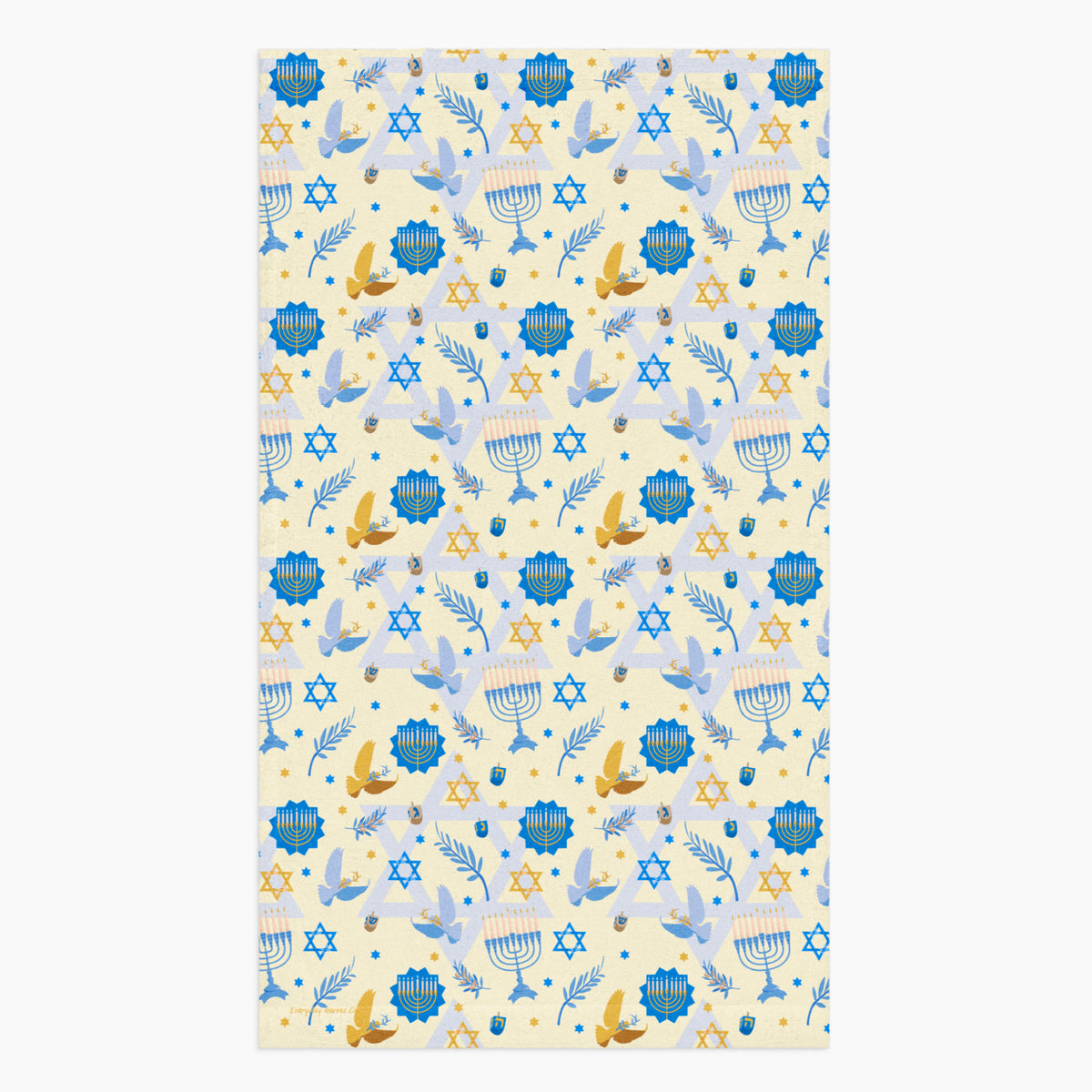 A rectangular microfiber fabric hand towel with a repeating festive pattern featuring blue menorahs, blue Star of David motifs, blue circular medallions, gold stars, and small gold and blue doves on a pale cream background.