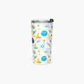 A tall insulated tumbler with a clear lid and black flip-straw detail, decorated with a festive pattern of blue and gold menorahs, Star of David stars, and doves on a pale yellow background.