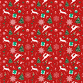 A festive Christmas gift wrapping paper pattern on a red background featuring white reindeer, green Christmas trees, white snowflakes, candy canes, wrapped gifts, and small holiday icons.