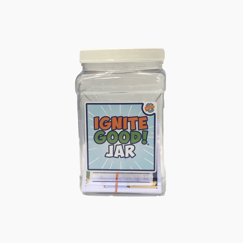 Clear square jar with white lid featuring text saying 'Ignite Good! Jar' on a white background