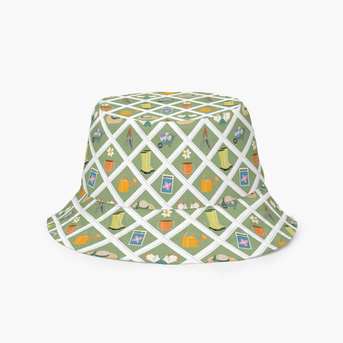 Reversible light green bucket hat with custom printed garden lattice fence design on a white background