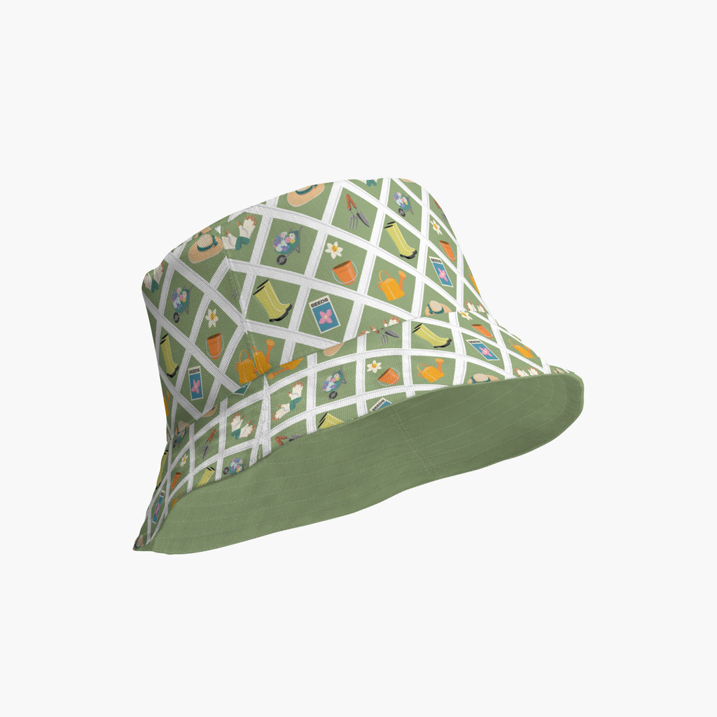 Reversible light green bucket hat with custom printed garden lattice fence design on a white background