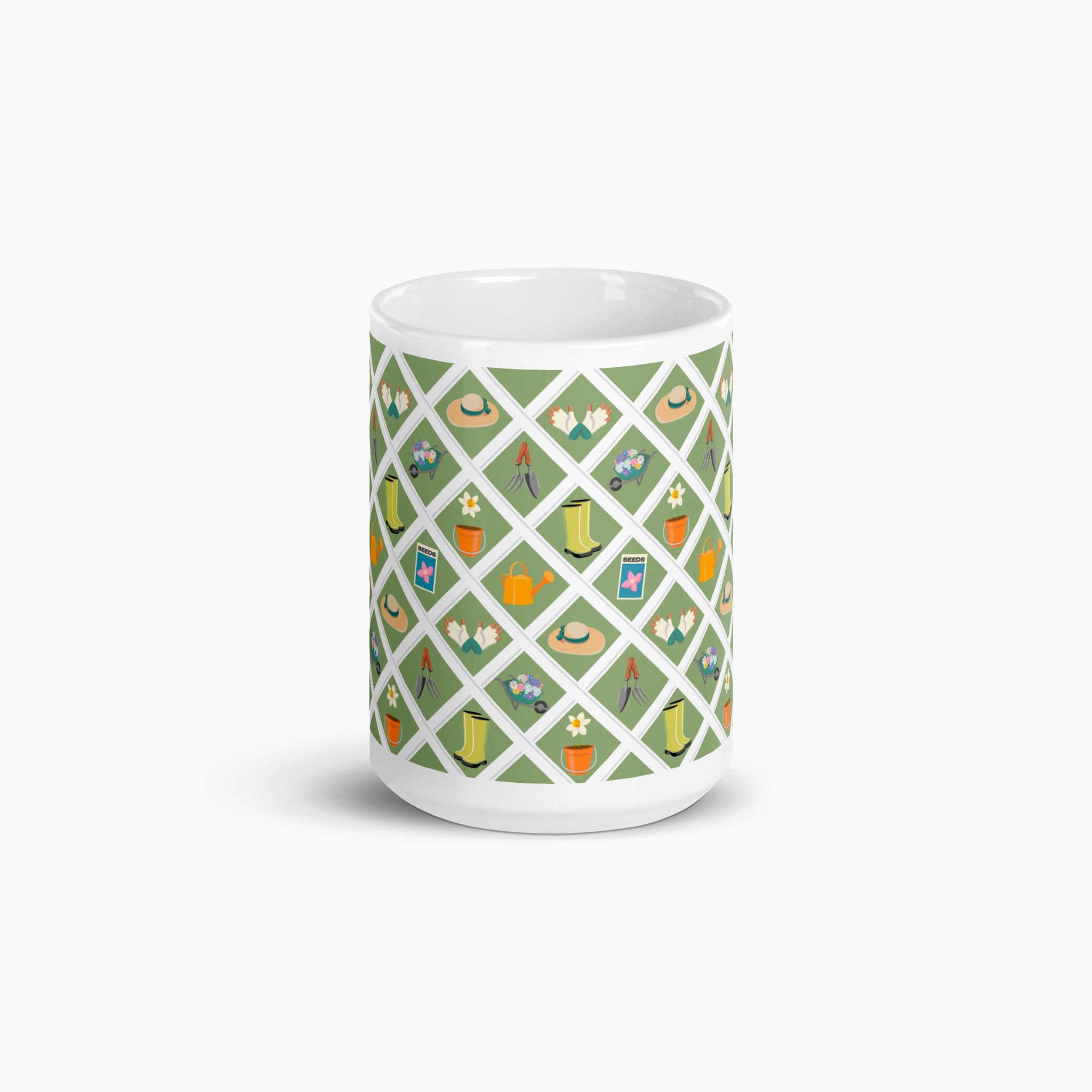 White mug with green garden lattice fence pattern on a white background