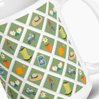White mug with green garden lattice fence pattern on a white background