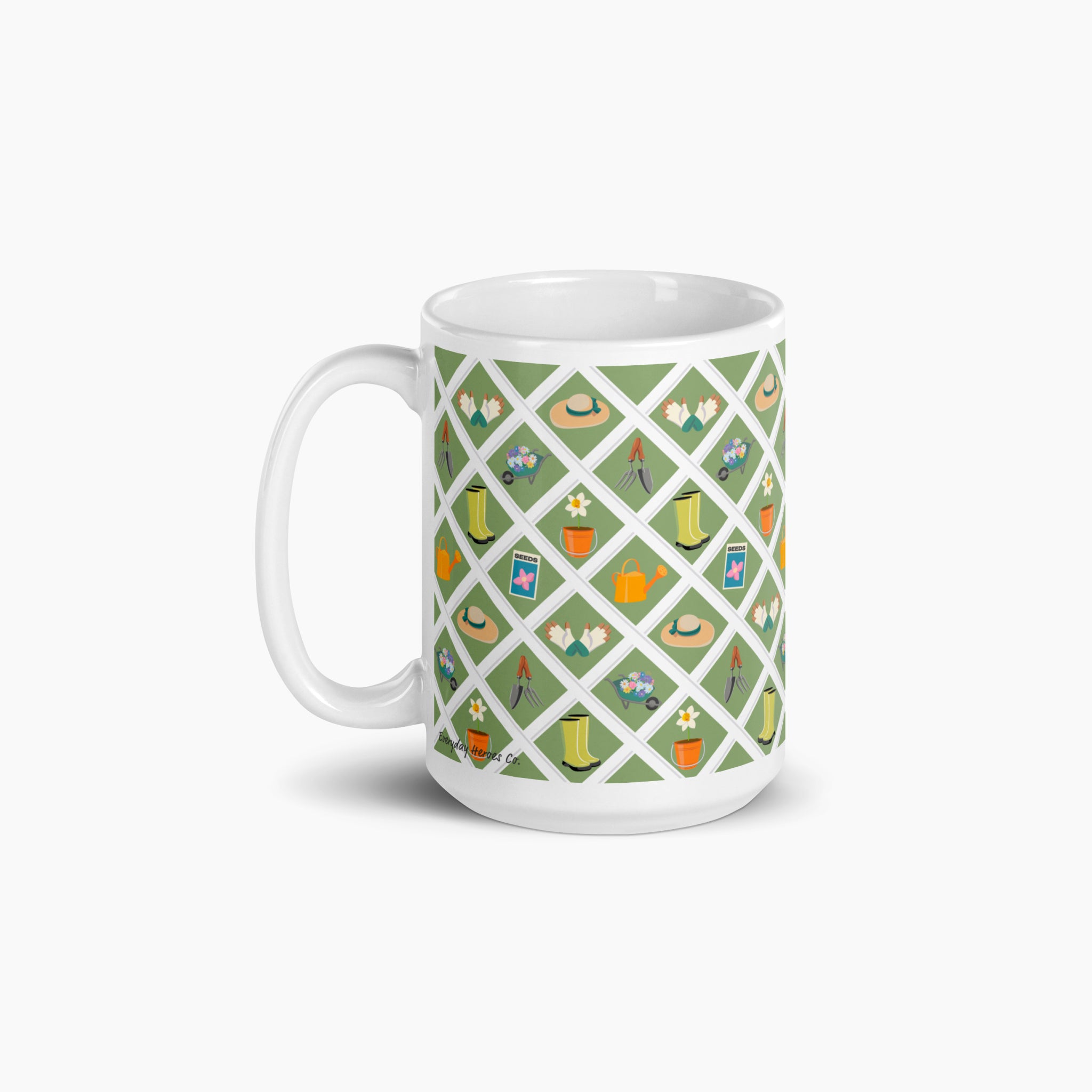 White mug with green garden lattice fence pattern on a white background