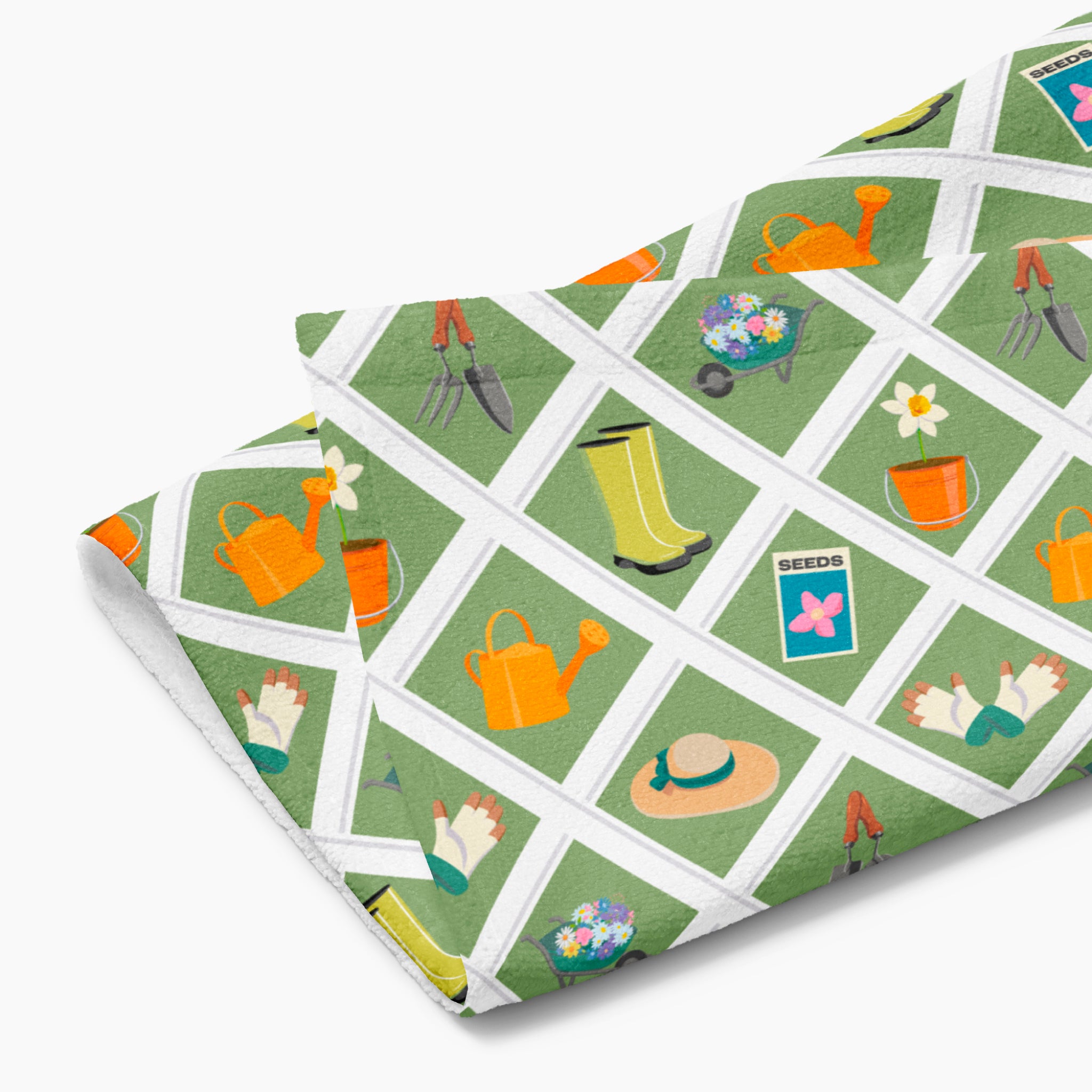 Cloth kitchen hand towel with green garden-themed pattern on a white background