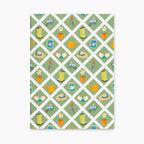Hardcover journal with green garden lattice fence patterned front cover design on a white background