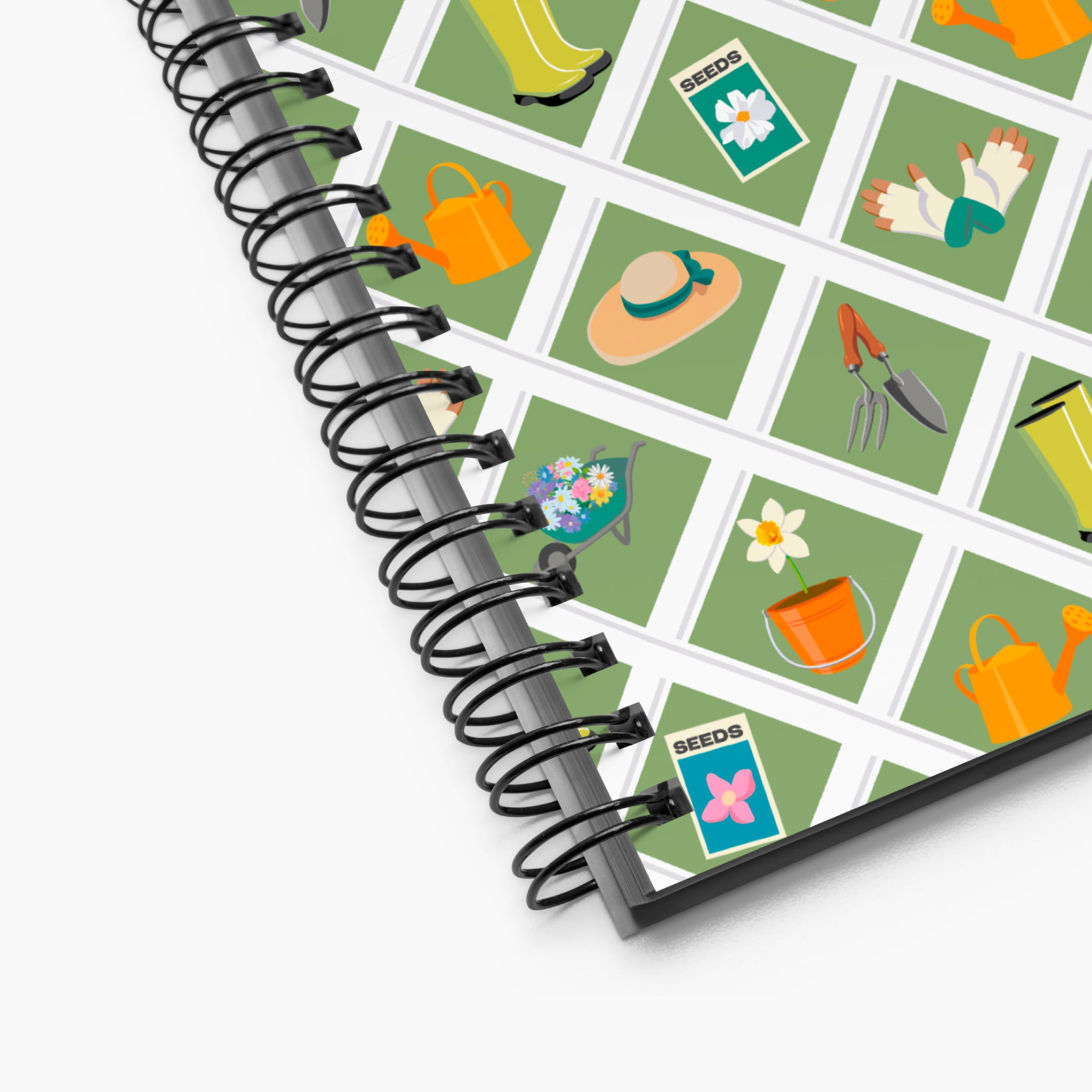 Spiral Notebook exterior, close-up with gardening-themed pattern on a white background