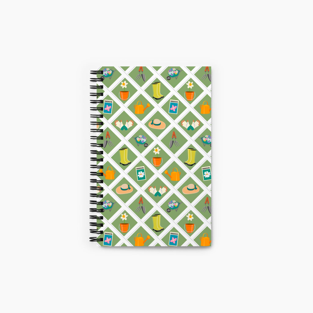 Spiral Notebook with gardening-themed pattern on a white background
