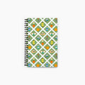 Spiral Notebook with gardening-themed pattern on a white background