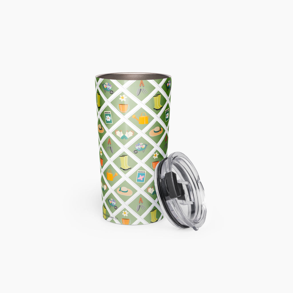 Tumbler with a green garden lattice fence pattern on a white background