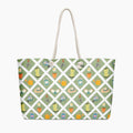 Tote bag with green gardening-themed pattern on a white background