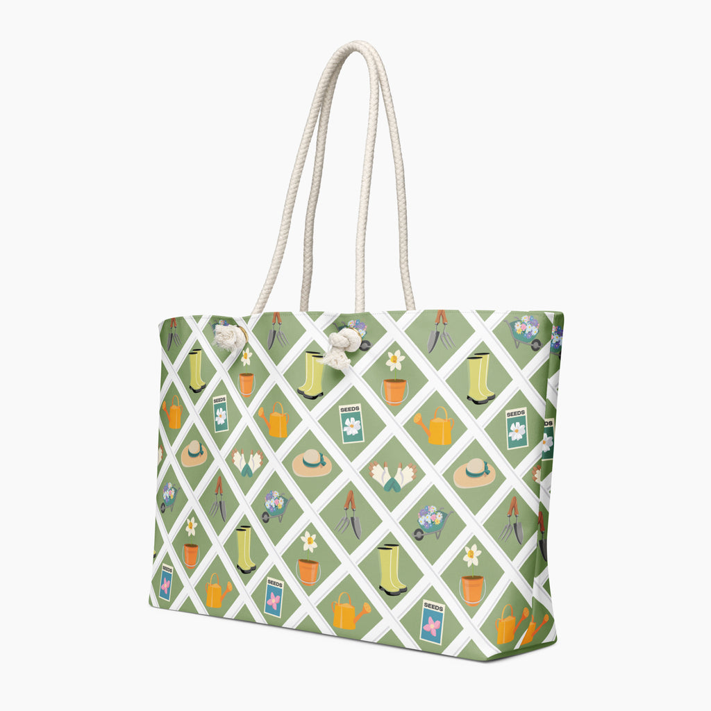 Tote bag with green gardening-themed pattern on a white background