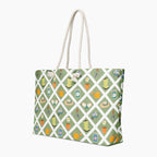 Tote bag with green gardening-themed pattern on a white background