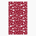 A rectangular deep red hand towel featuring a repeating white Christmas pattern with Santa Claus, sleighs, trees, snowflakes, and winter motifs, shown on a light gray background.