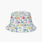 Reversible bucket hat with custom printed white floral design on a white background