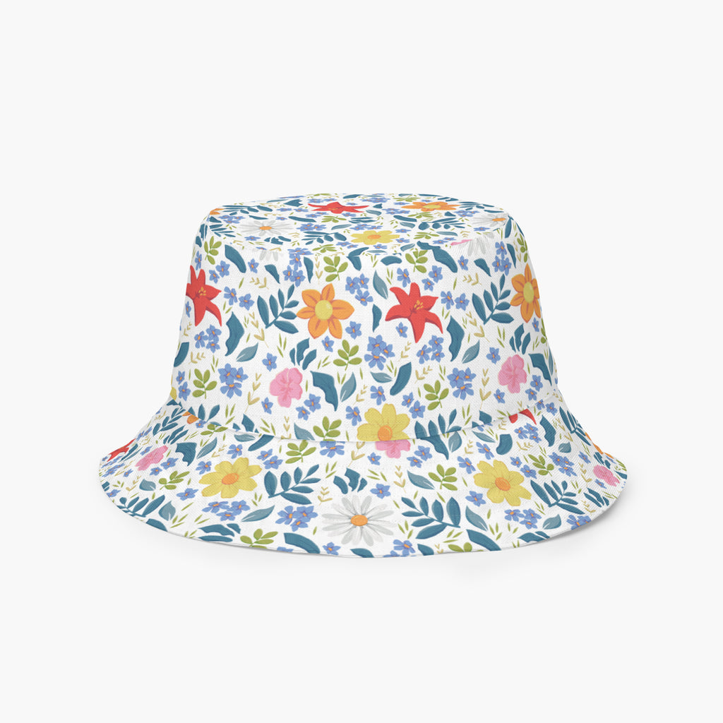 Reversible bucket hat with custom printed white floral design on a white background