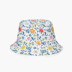 Reversible bucket hat with custom printed white floral design on a white background