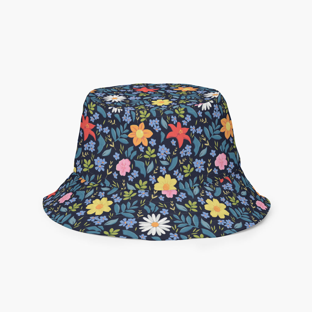 Reversible bucket hat with custom printed blue floral design on a white background