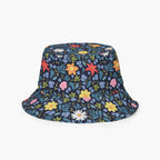 Reversible bucket hat with custom printed blue floral design on a white background