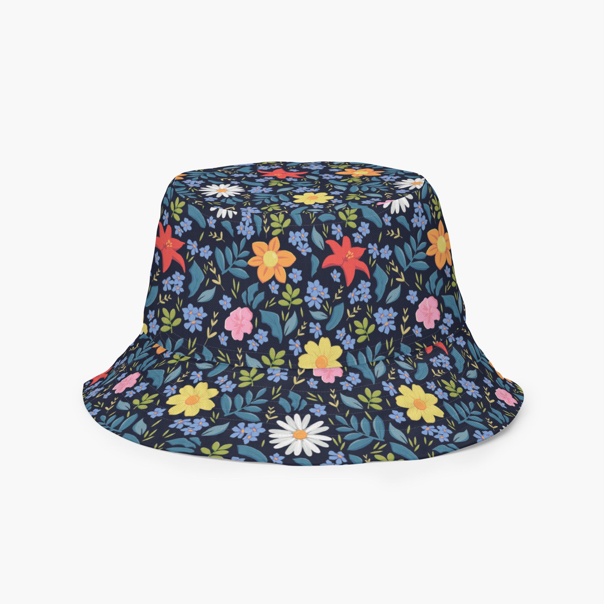 Reversible bucket hat with custom printed blue floral design on a white background