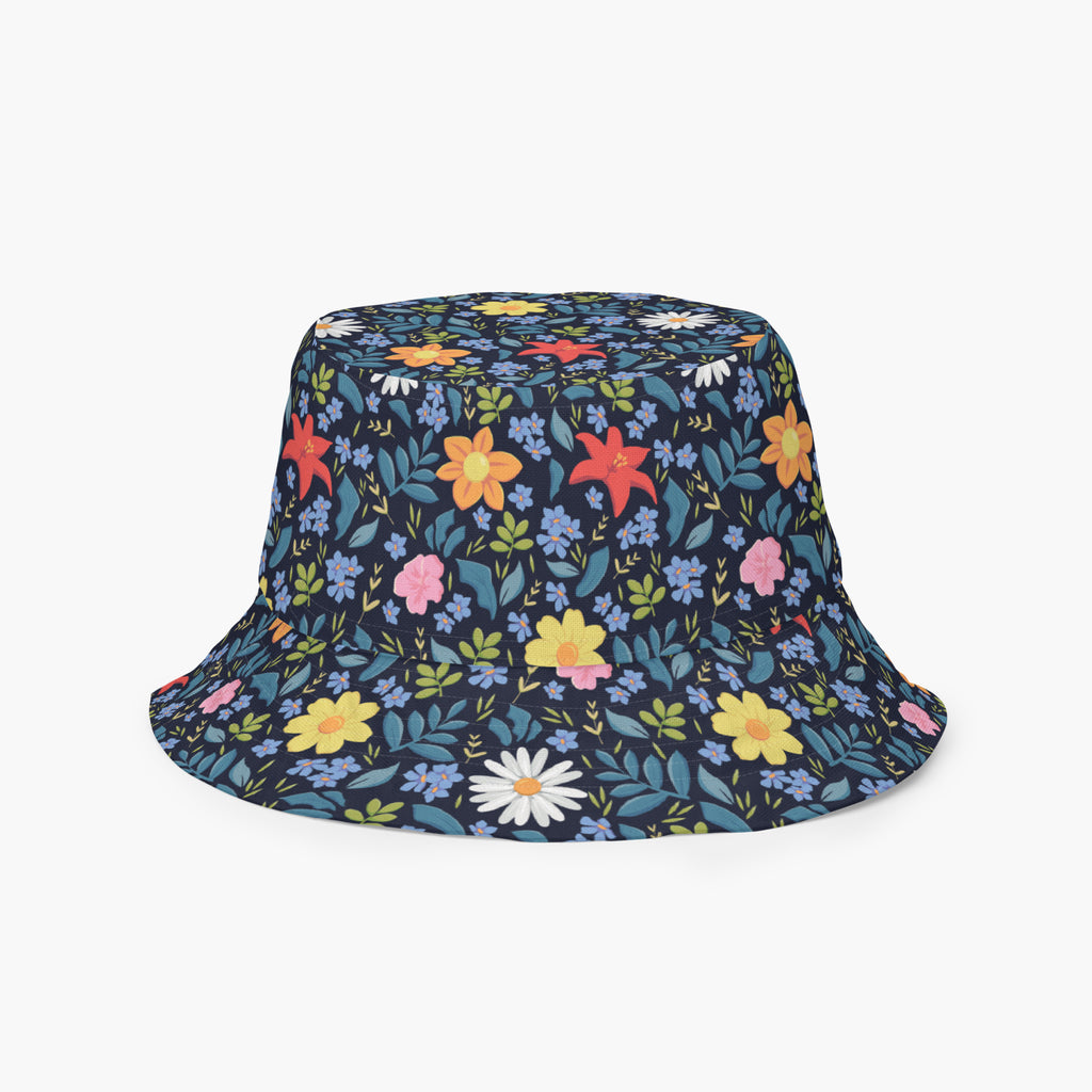 Reversible bucket hat with custom printed blue floral design on a white background
