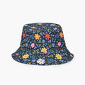 Reversible bucket hat with custom printed blue floral design on a white background