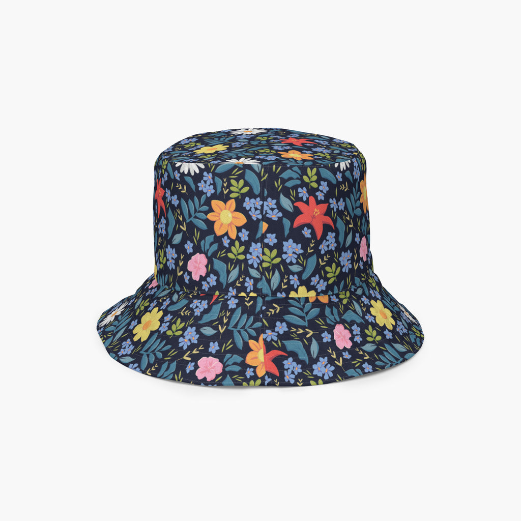 Reversible bucket hat with custom printed blue floral design on a white background