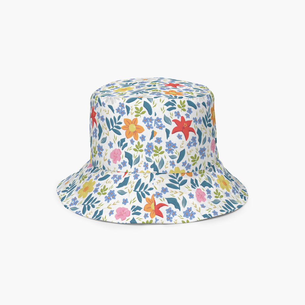 Reversible bucket hat with custom printed white floral design on a white background