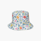 Reversible bucket hat with custom printed white floral design on a white background