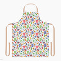 Colorful apron with dad-themed pattern on a white background