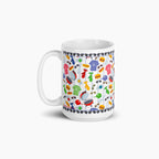 White mug with colorful dad-themed design on a white background
