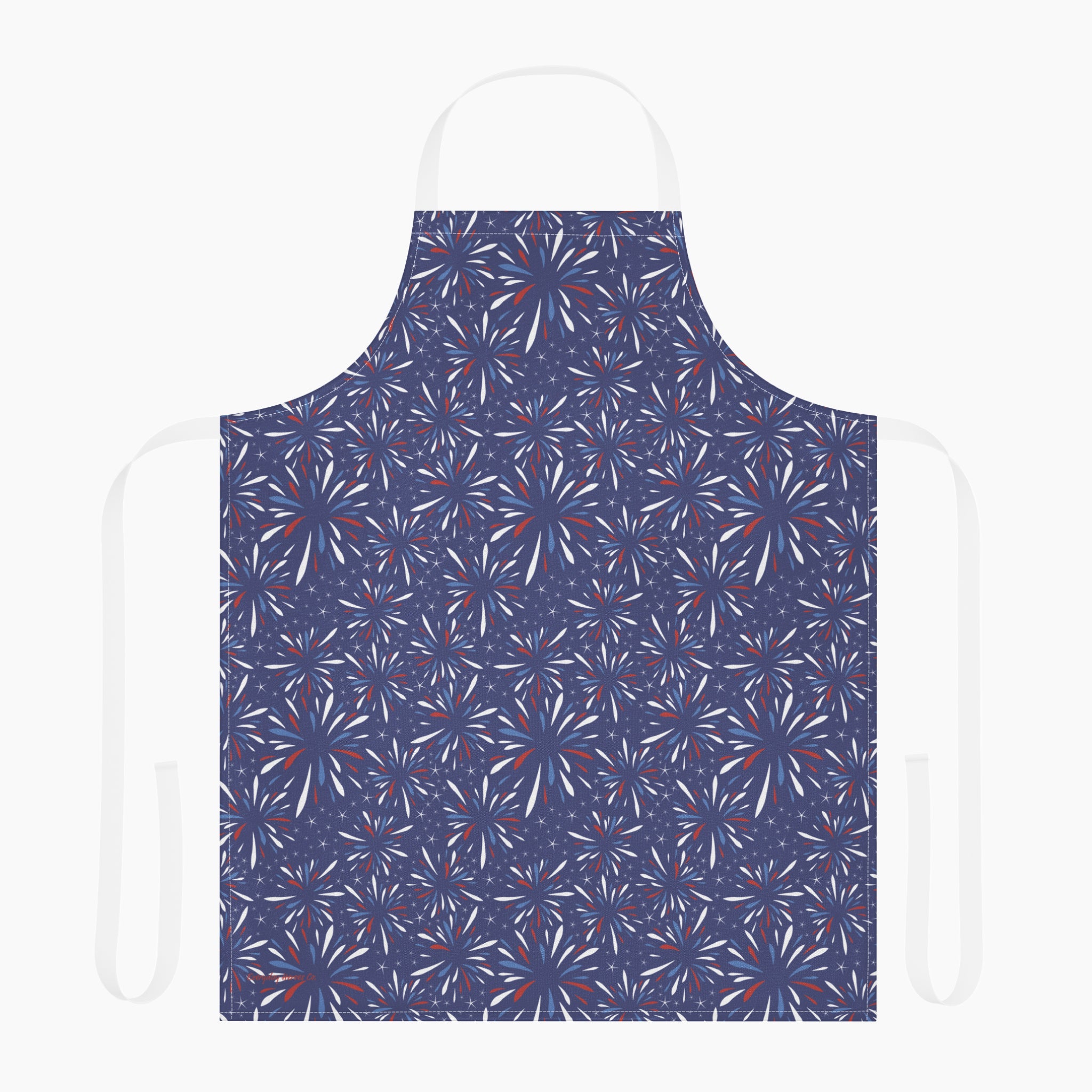 Navy blue apron with red white and blue firework pattern on a white background