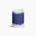 White mug with blue and fireworks design on a white background
