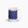 White mug with blue and fireworks design on a white background