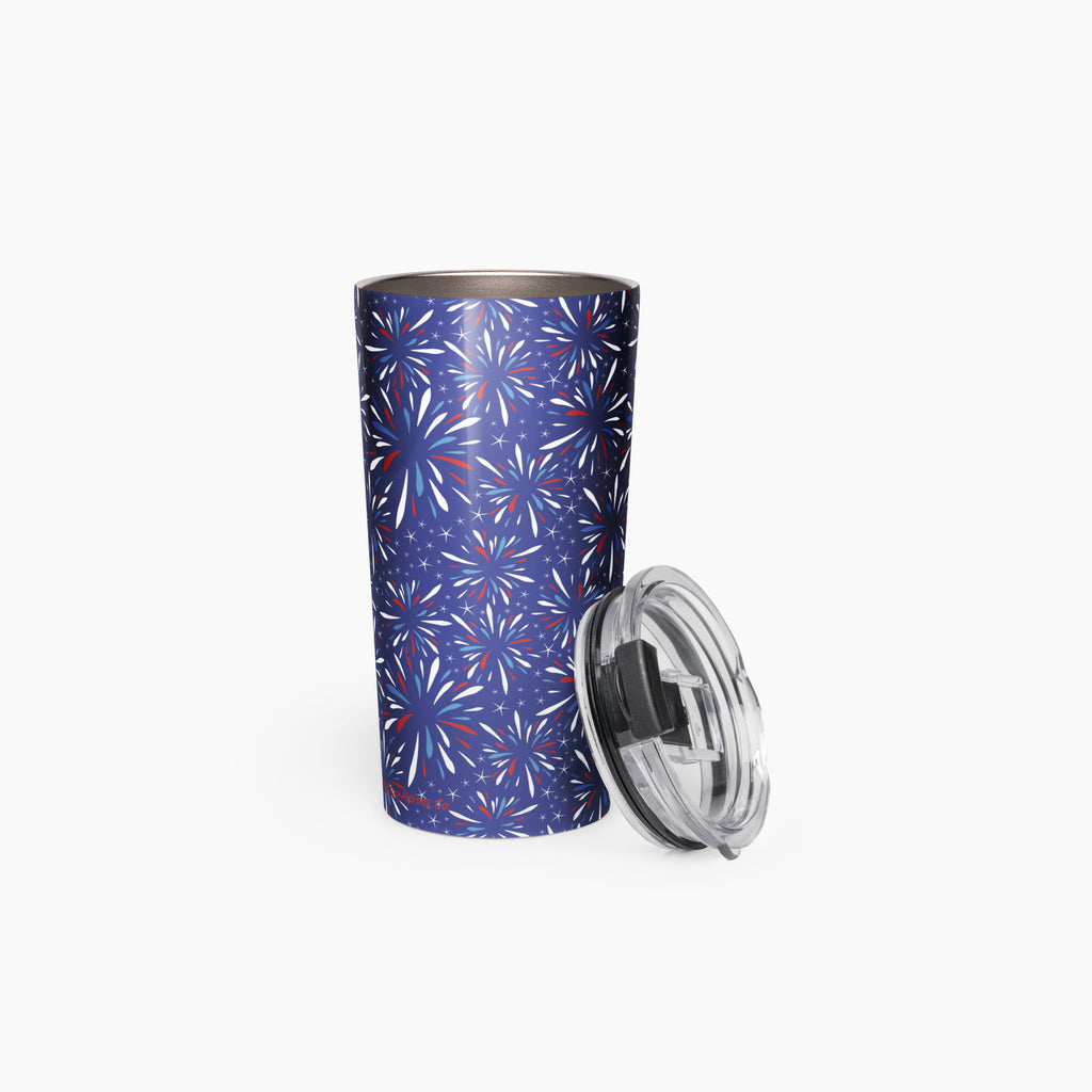Tumbler with a blue fireworks-themed pattern on a white background