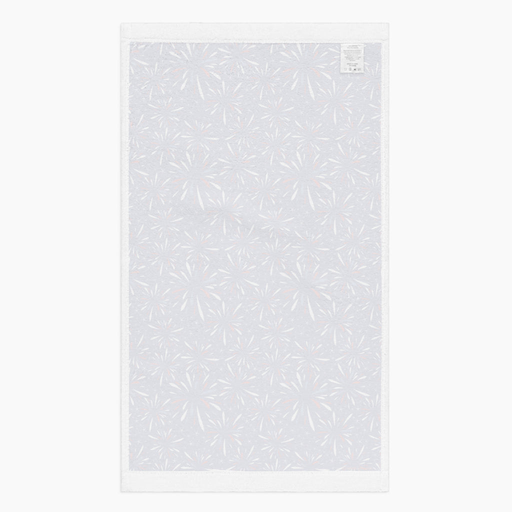 White back of Cloth kitchen hand towel with firework pattern on a white background