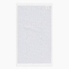 White back of Cloth kitchen hand towel with firework pattern on a white background